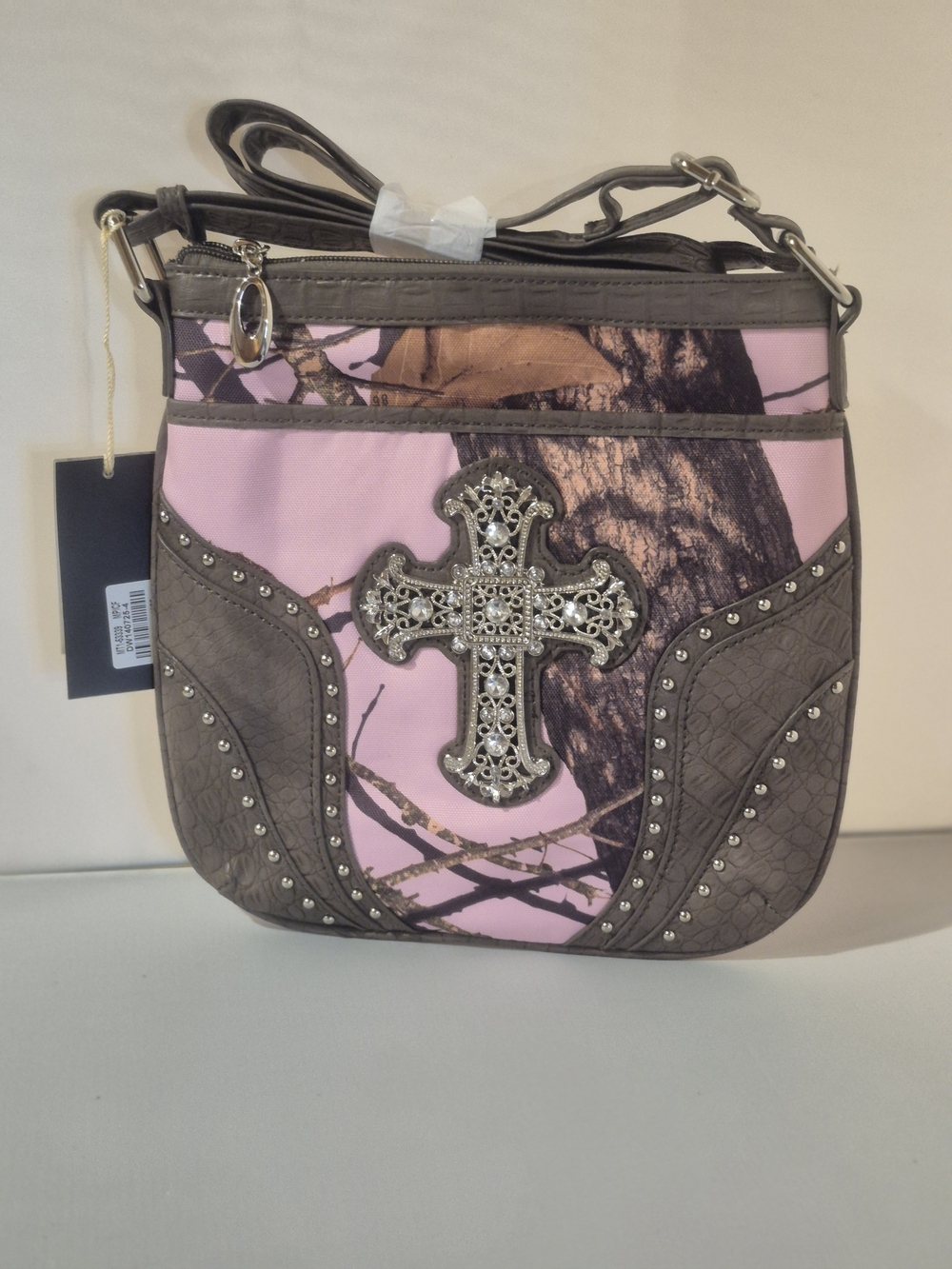 Mossy Oak Pink Camo Crossbody Bag with Brown Trim and Decorative Cross Brand New
